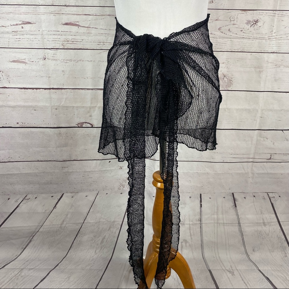 Jordan Taylor fishnet wrap throw on beach wrap